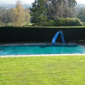 Swimming pool safety cover.