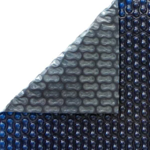 Blue bubble wrap material, protective and insulating pool cover.
