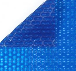 Blue bubble pool cover, durable polyethylene, water heating & debris protection.
