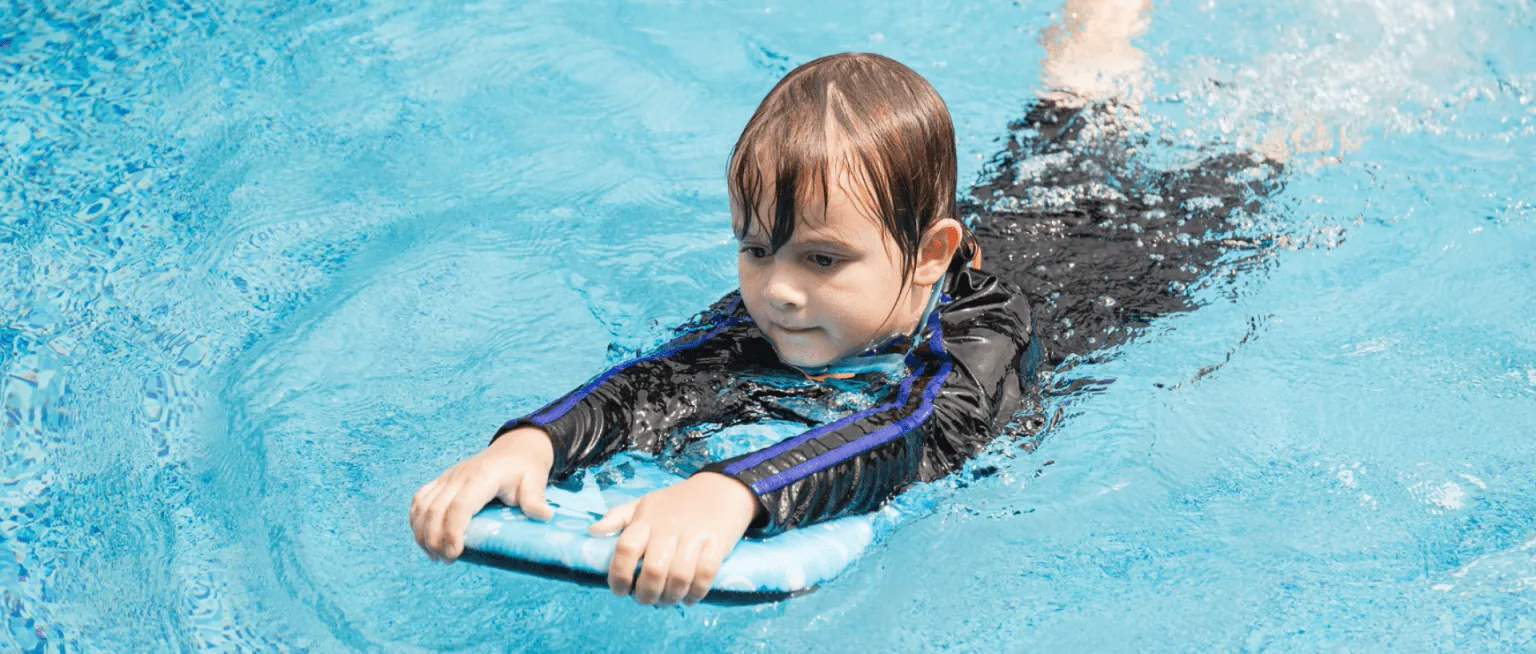 Homepage banner image of a child swimming.