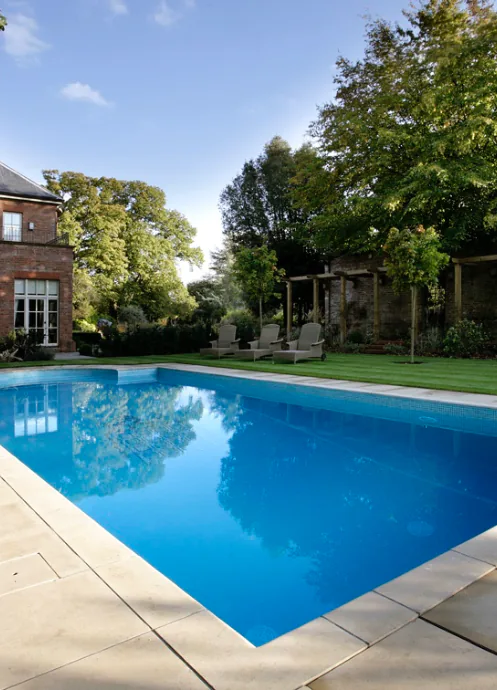 Image of an outdoor inground swimming pool.