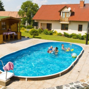 A blu-line swimming pool in a garden with kids and adults playing in the pool.